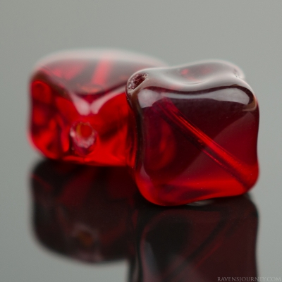 Diagonal Hole Cube (9x7mm) Red Garnet Transparent