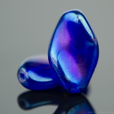 Twist (13x8mm) Cobalt Transparent with Rainbow Luster
