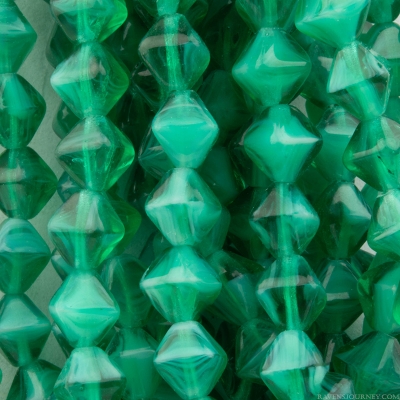 Bicone (6X6mm) Emerald Green Transparent with White Core
