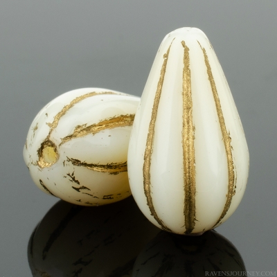 Melon Drop (13x8mm) Ivory Opaque with Gold Wash, 11 Strands of 10 Beads per Unit *Last Unit Remaining*
