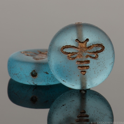 Pressed Coin with Bee (12mm) Capri Blue Transparent Matte with Dark Bronze Wash, 9 Strands of 12 Beads per Unit *Last Unit Remaining*